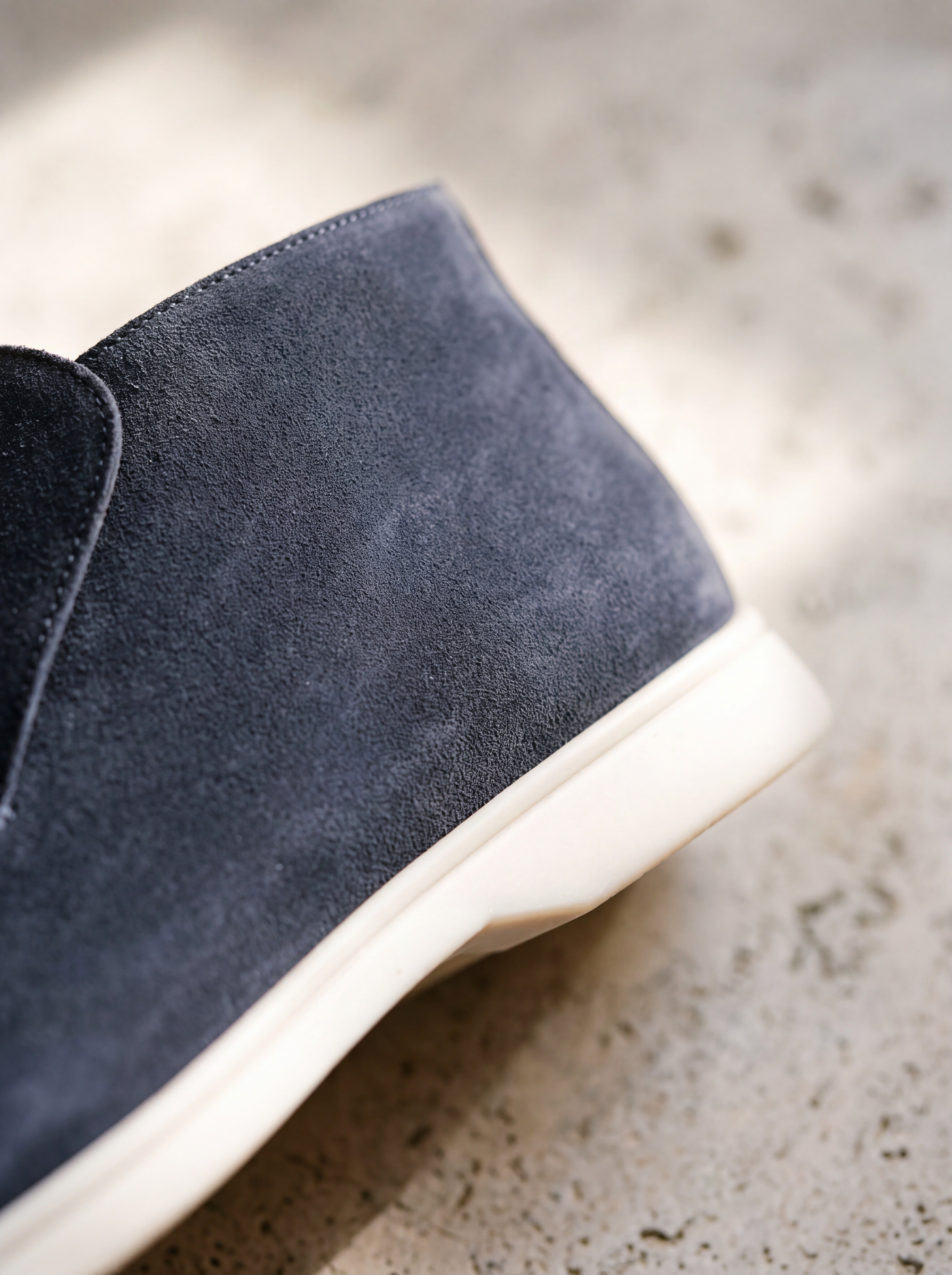 Close detail of the ankle, seam line and low stacked heel on the Francesco Bellani Varenna high loafer