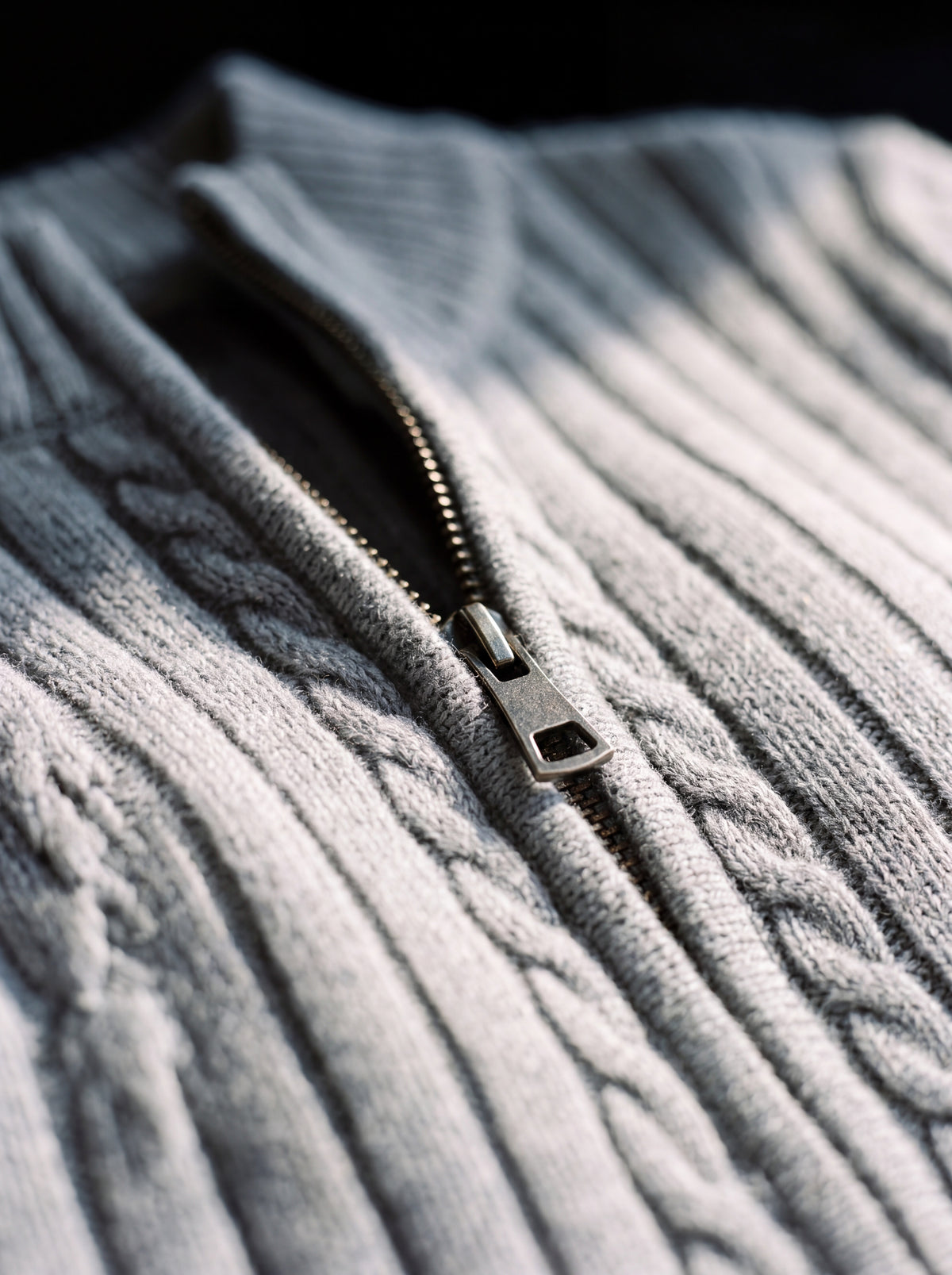 Close detail of the cable relief and metal zip pull on the Francesco Bellani Aosta wool zip-through
