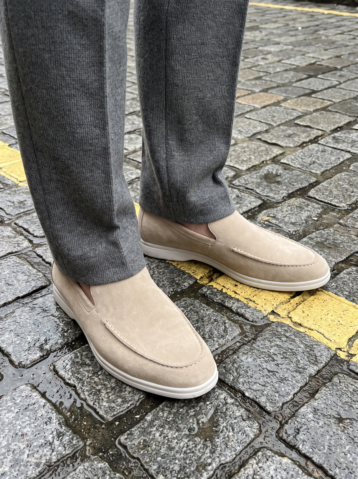 Linen beige suede loafers on wet cobbles — Francesco Bellani Bellagio