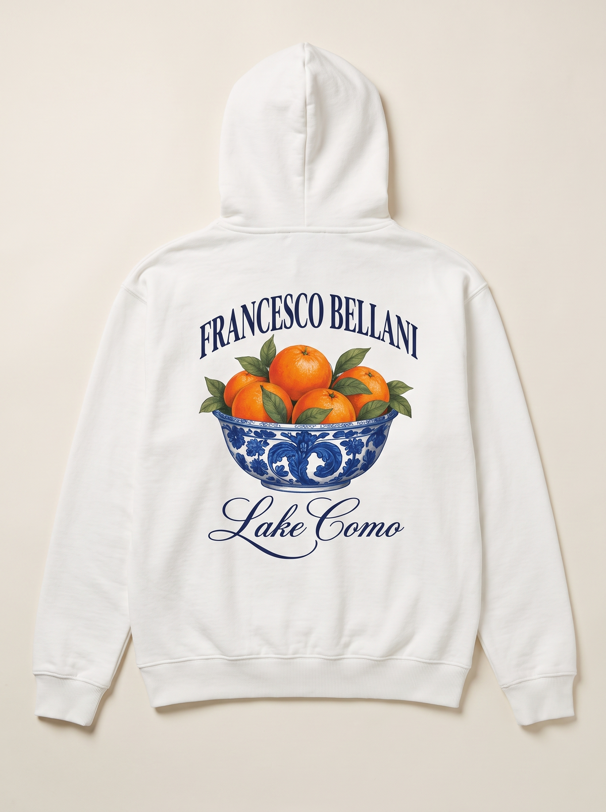 Moltrasio Printed Hoodie in white, back view, showing the printed maiolica bowl of oranges with Francesco Bellani above and Lake Como below